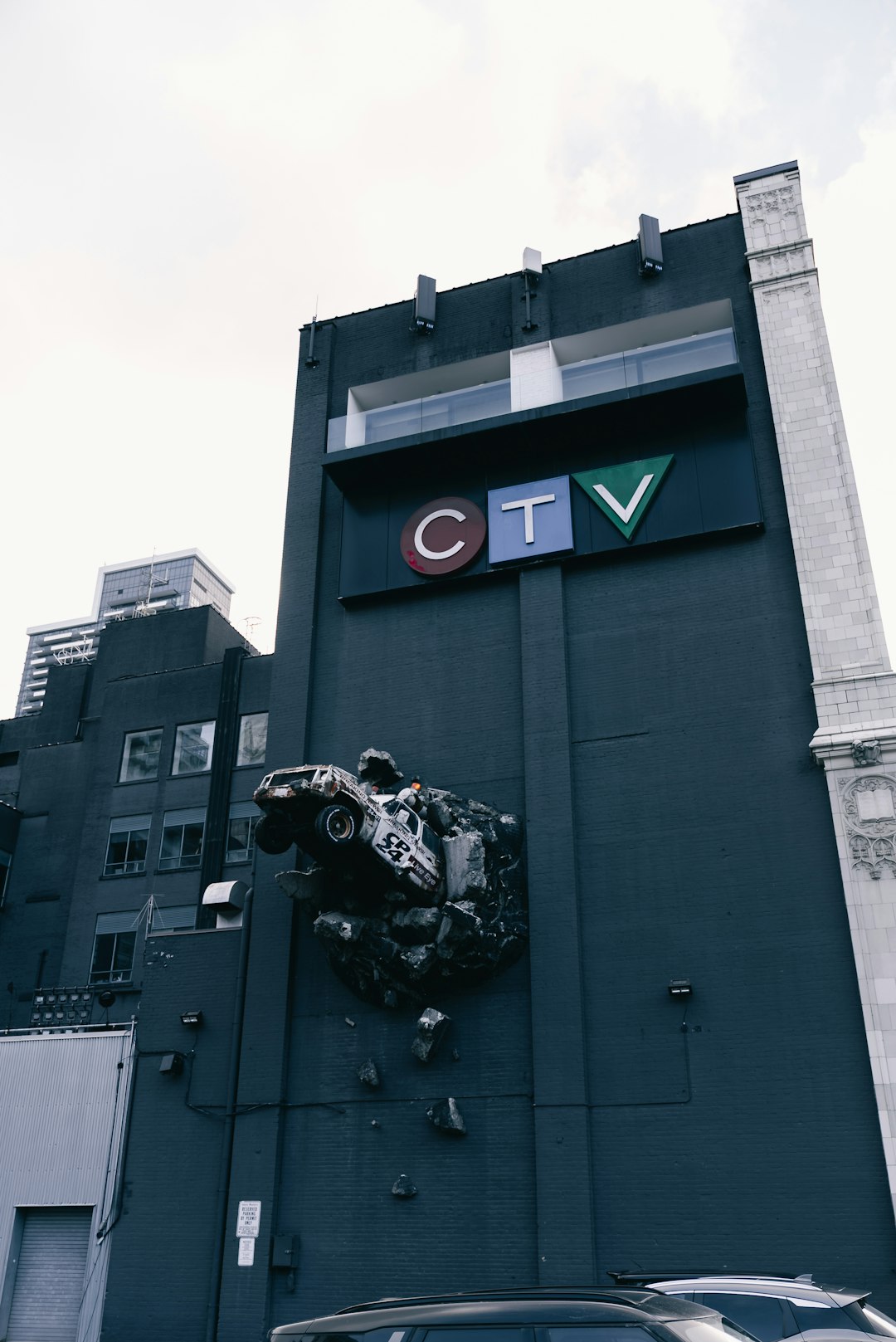 dark-building-with-ctv-logo-and-metal-sculpture-dwaopb9ewle